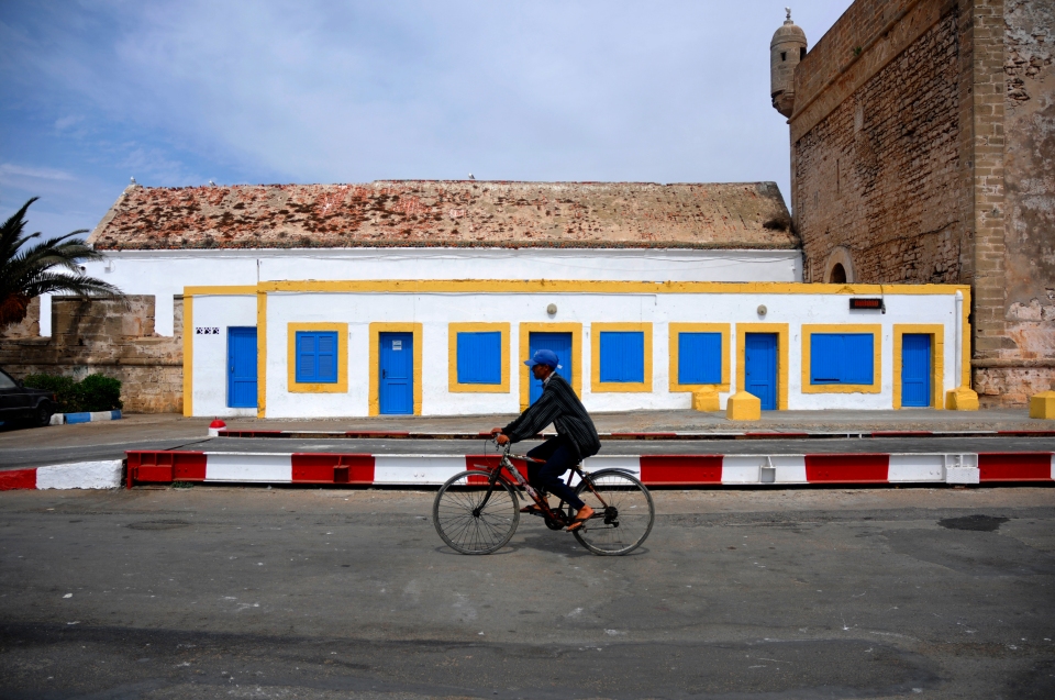 Man on bike, Morocco - Image by Kristian Bertel