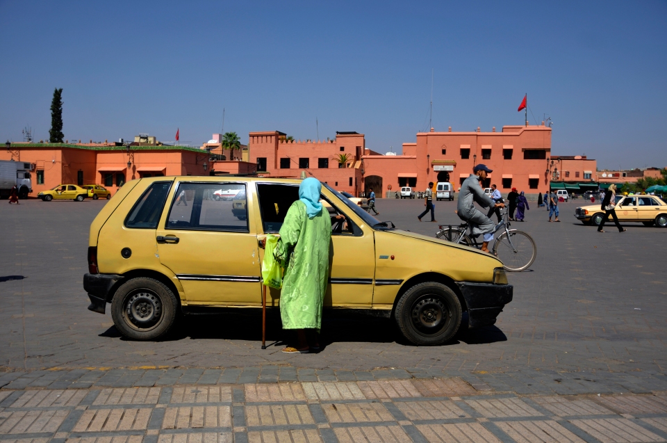 Woman and car, Morocco - Image by Kristian Bertel