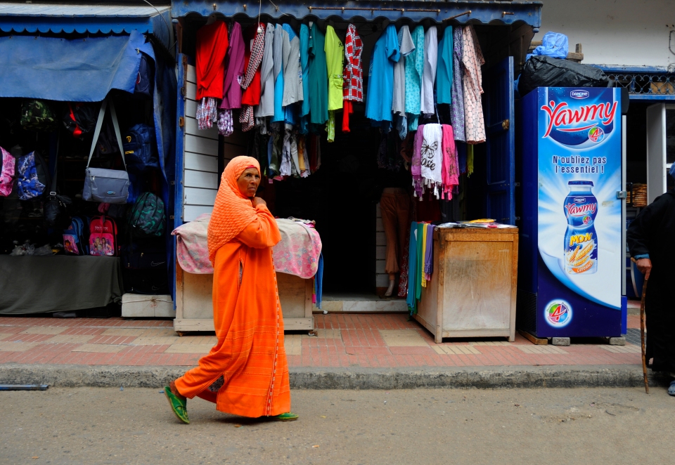 Woman in orange, Morocco - Image by Kristian Bertel